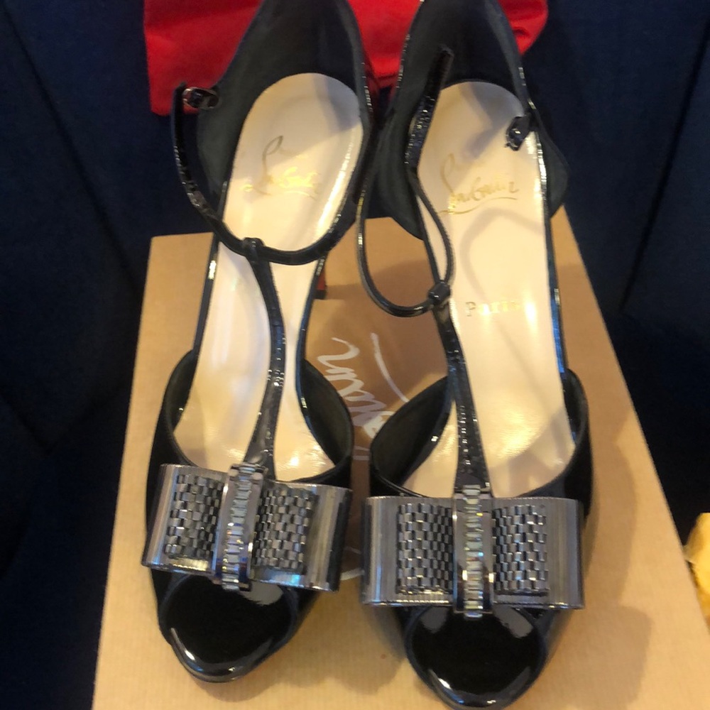 Louboutin black ladder shoes. ARCHIDISCO